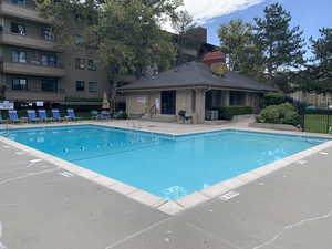 Community pool featuring a patio