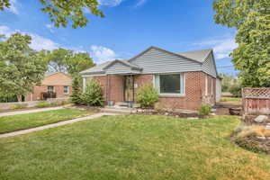View of front of property featuring brick siding