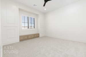 Spare room featuring light carpet, recessed lighting, and ceiling fan