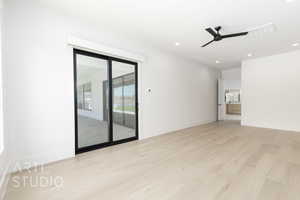 Unfurnished room featuring light wood finished floors, recessed lighting, and a ceiling fan