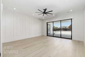 Empty room with light wood-style floors, recessed lighting, and a ceiling fan