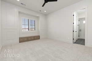 Unfurnished bedroom featuring carpet flooring, multiple windows, ceiling fan, and recessed lighting