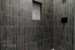 Bathroom with a tile shower