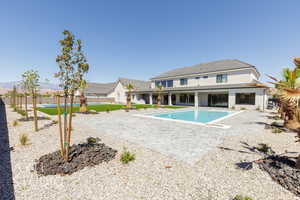 Outdoor pool with a patio area