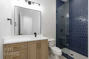 Full bathroom with vanity and a tile shower