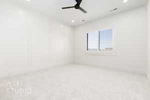 Unfurnished room with light carpet, ceiling fan, and recessed lighting