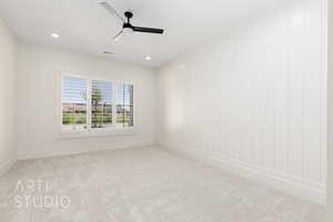 Empty room with carpet floors, recessed lighting, and ceiling fan