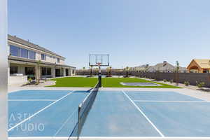 View of sport court with a residential view and community basketball court
