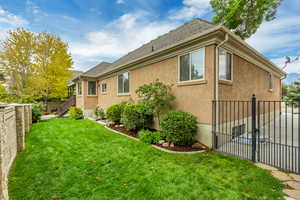 View of home's exterior featuring stucco siding