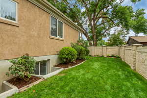 View of fenced backyard