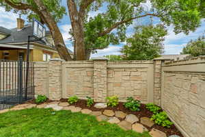 View of yard with a gate