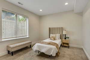 Bedroom featuring recessed lighting and carpet flooring