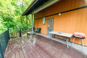 Wooden terrace with area for grilling