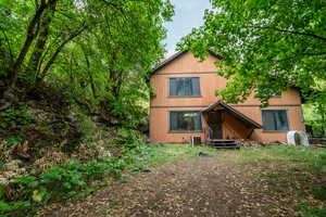 View of property with a deck
