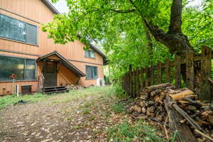 View of yard featuring entry steps