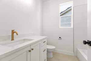 Bathroom with vanity and light tile patterned flooring