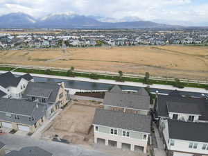 Aerial perspective of suburban area featuring mountains