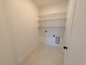 Laundry room with washer hookup and electric dryer hookup