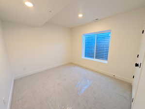 Basement bedroom #3 with baseboards and recessed lighting