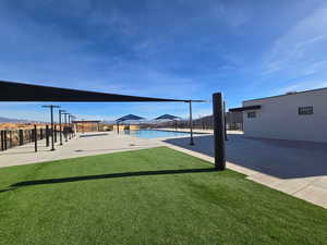 View of community with a patio and a pool