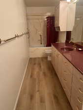 Full bath with shower and jetted tub. New vinyl flooring and faucet