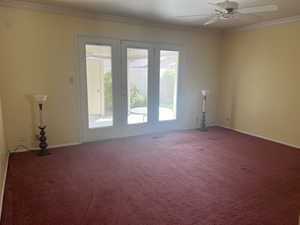 Master bedroom with French doors to courtyard