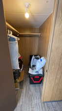 Walk in closet featuring light wood-type flooring