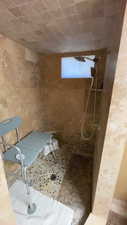 Full bath with tiled shower