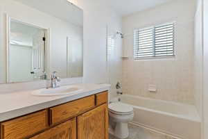 Full bath with  shower combination and vanity