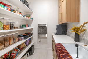 Storage area with a sink