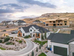 Aerial view of residential area featuring mountains
