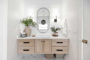 Bathroom featuring vanity and light tile patterned floors