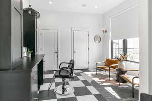 Home office featuring recessed lighting and dark floors