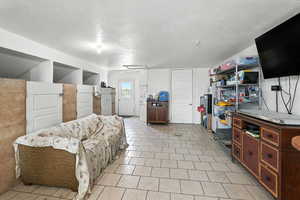 Living room featuring a textured ceiling