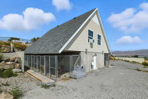 View of outdoor structure featuring a mountain view and an exterior structure