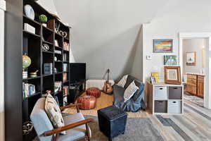 Living area with wood finished floors