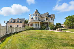 Victorian home with a porch