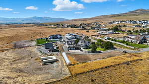 Aerial perspective of suburban area featuring mountains