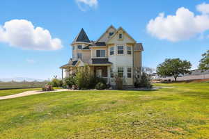 Victorian-style house with a porch