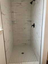 Bathroom featuring a stall shower