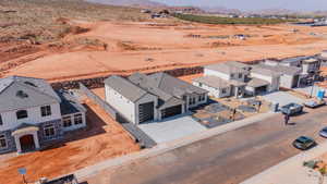 Aerial perspective of suburban area with a mountain backdrop
