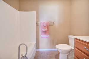 Bathroom with vanity and tile patterned floors