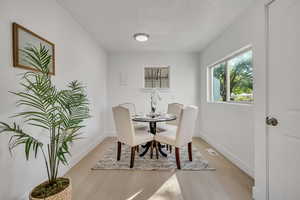 Dining room with light wood-type flooring