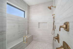 Bathroom featuring a shower stall