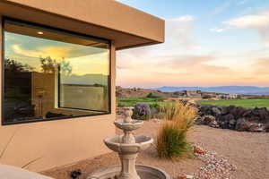 Balcony at dusk with a mountain view