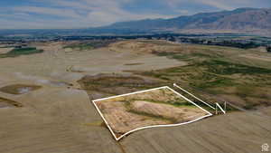 View of rural area with property parcel outlined and mountains