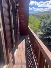 Balcony with a wooded view