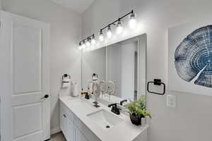 Bathroom featuring double vanity