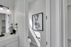 Bathroom featuring vanity and light tile patterned flooring