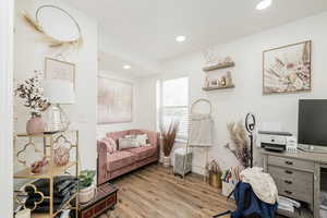 Home office with recessed lighting and wood finished floors